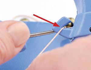 Cord being pulled through the Yoke